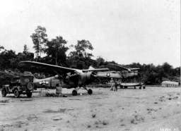 Two L-1's at an airfield in Burma, ca December 1944.jpg